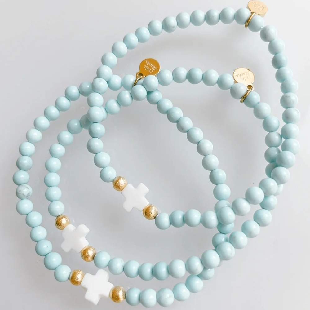 Cola Stacks Blue Beaded Cross Bracelet